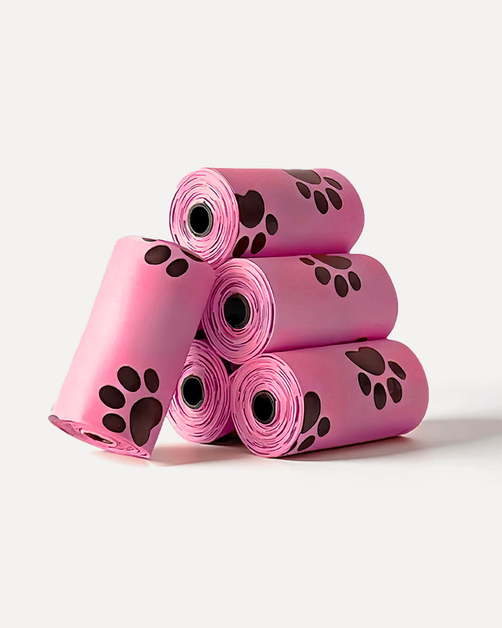 Overview of MIGO Pets biodegradable dog poop bags in pink, featuring a stacked roll display.