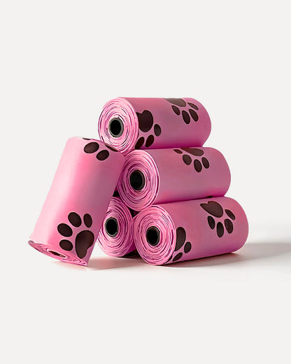 Overview of MIGO Pets biodegradable dog poop bags in pink, featuring a stacked roll display.