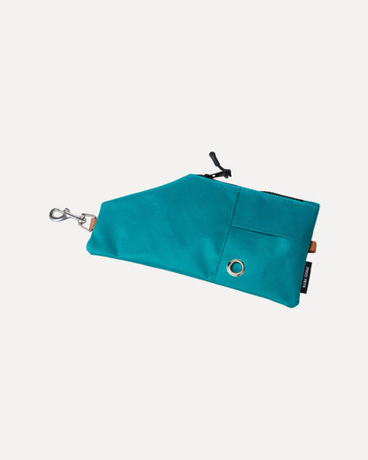 Overview of the durable and versatile crossbody travel pouch in jade green, featuring its complete design.
