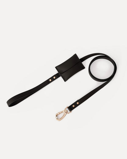 Overview of the waterproof leather dog leash with bag holder in black, featuring its complete design.